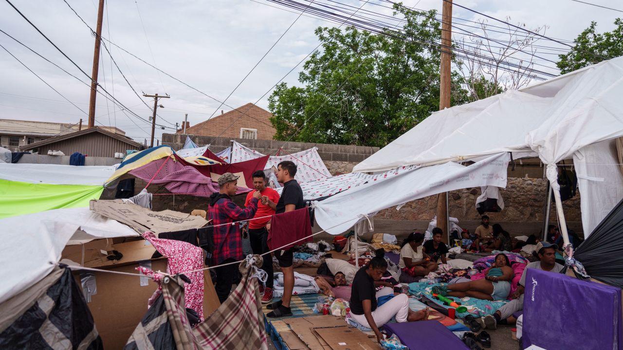 Migrants camp out in front of Opportunity Center for the Homeless in El Paso, Texas..