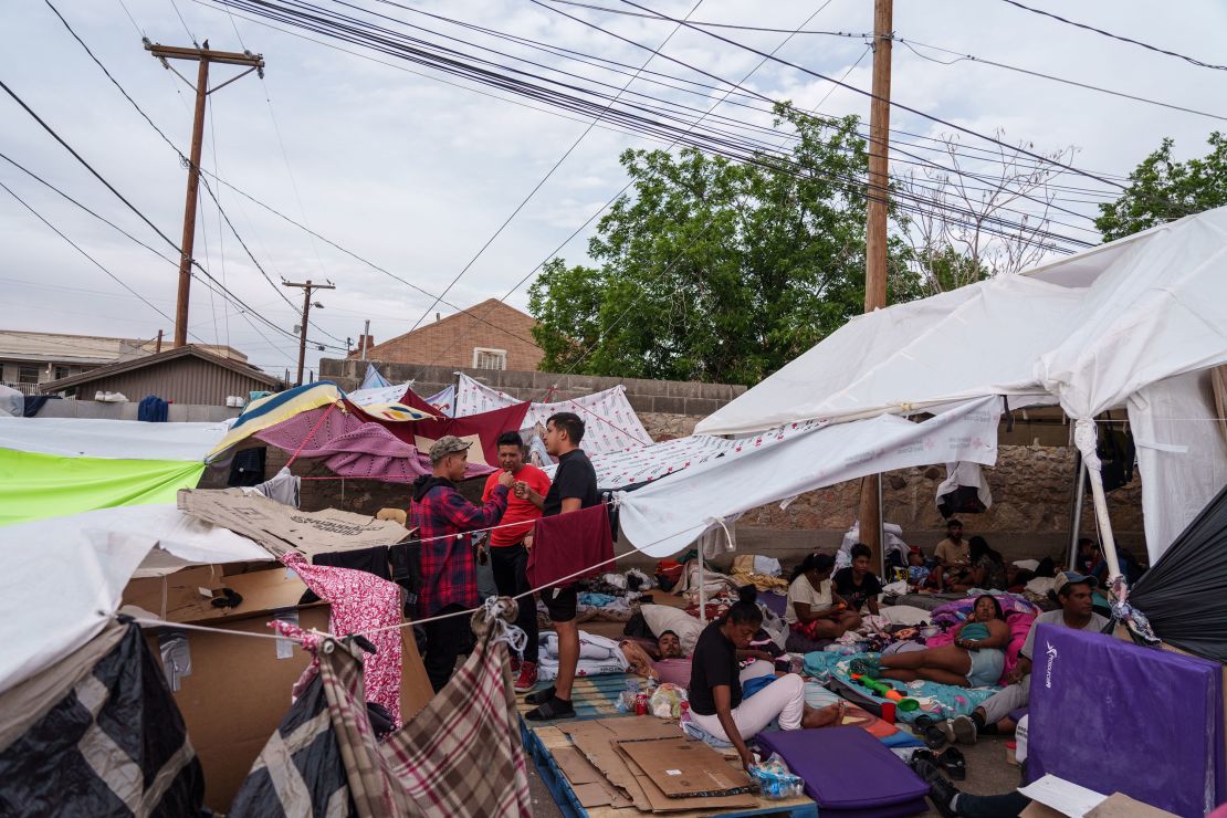 Migrants camp out in front of Opportunity Center for the Homeless in El Paso, Texas..