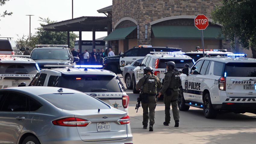 ALLEN, TEXAS - MAY 6: Emergency personnel work the scene of a shooting at Allen Premium Outlets on May 6, 2023 in Allen, Texas. According to reports, a shooter opened fire at the outlet mall, injuring nine people who were taken to local hospitals. The police have confirmed there were fatalities but have not specified how many. The unidentified shooter was neutralized by an Allen Police officer responding to an unrelated call.