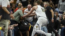 Nikola Jokić wrestled with Phoenix Suns owner Mat Ishbia in game 4 of the Western Conference semifinal. 