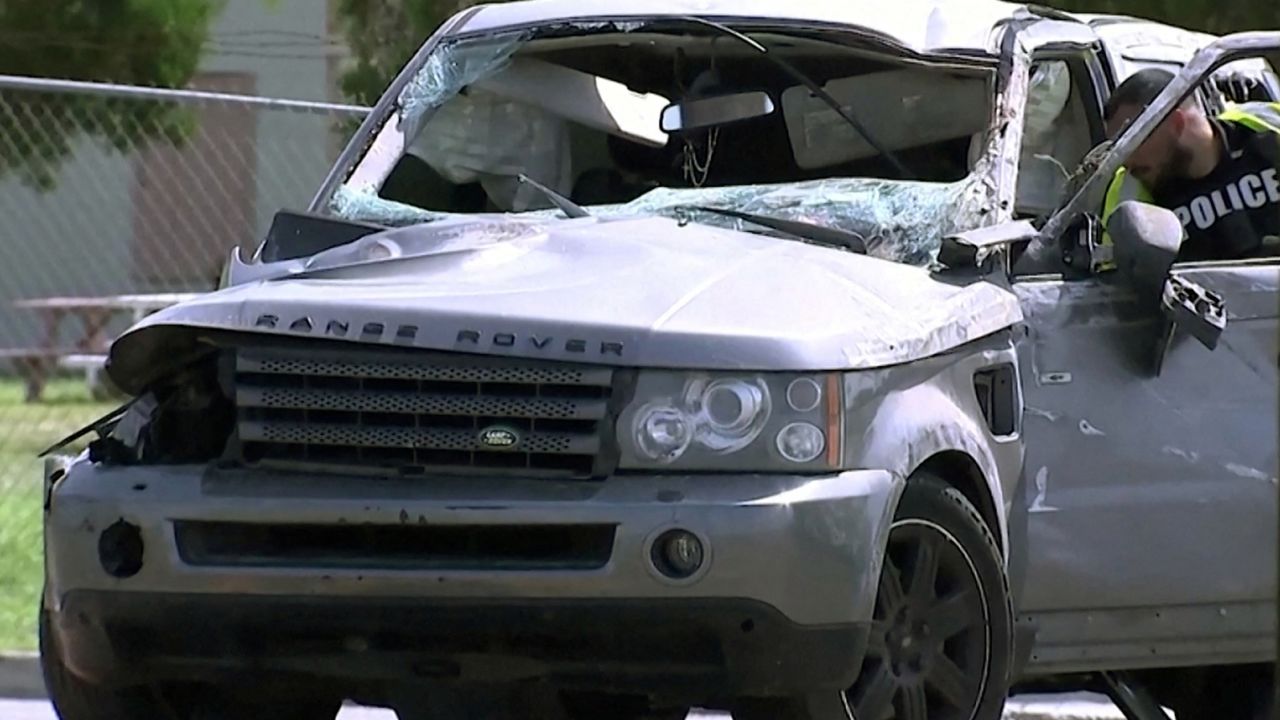 A damaged vehicle at the scene of the deadly crash on Sunday.