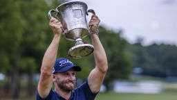 May 7, 2023: Wyndham Clark rasies the Wells Fargo Championship Trophy after winning the 2023 Wells Fargo Championship at Quail Hollow Club in Charlotte, NC. (Scott Kinser/Cal Sport Media)(Credit Image: © Scott Kinser/Cal Sport Media) (Cal Sport Media via AP Images)