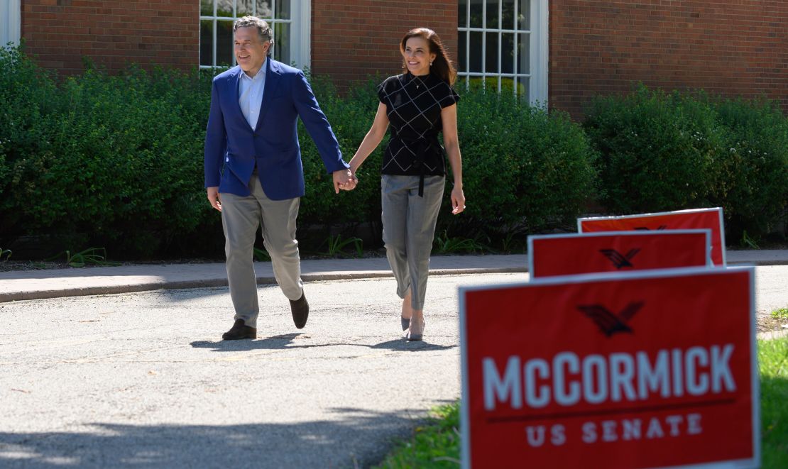 Then-Republican Senatorial candidate David McCormick and his wife Dina Powell McCormick heads to vote at his polling location on the campus of Chatham University on May 17, 2022 in Pittsburgh, Pennsylvania.