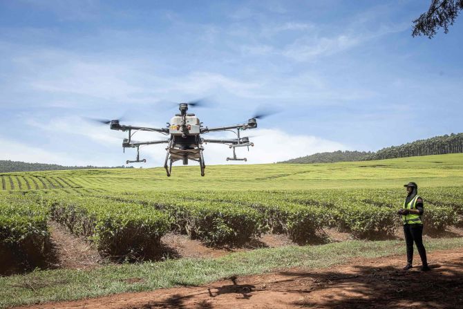 Amid a worsening climate crisis, technology has a vital role to play in ensuring we can produce enough food for a rapidly growing population. Pictured, a Kenya Airways unmanned aerial vehicle (UAV) spreads fertilizer at a farm in Musereita, Kenya. 