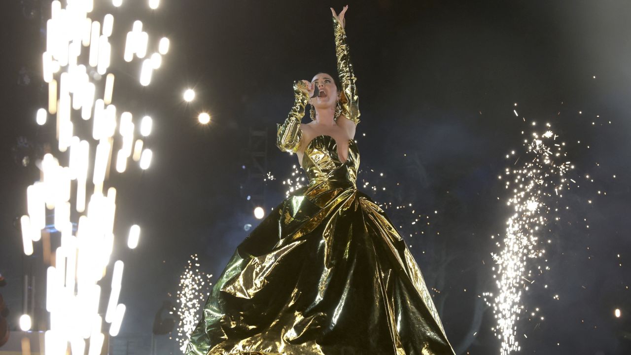 Katy Perry performs an orchestra version of "Roar" complete with an aerial drone display of a lion floating above the stage.