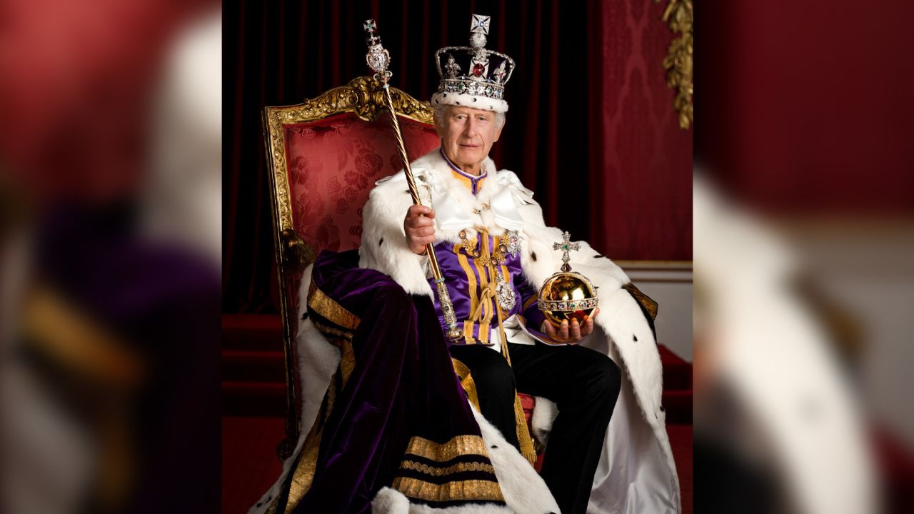 In this photo made available by Buckingham Palace on Monday, May 8, 2023, Britain's King Charles III poses for a photo in full regalia in the Throne Room, London.