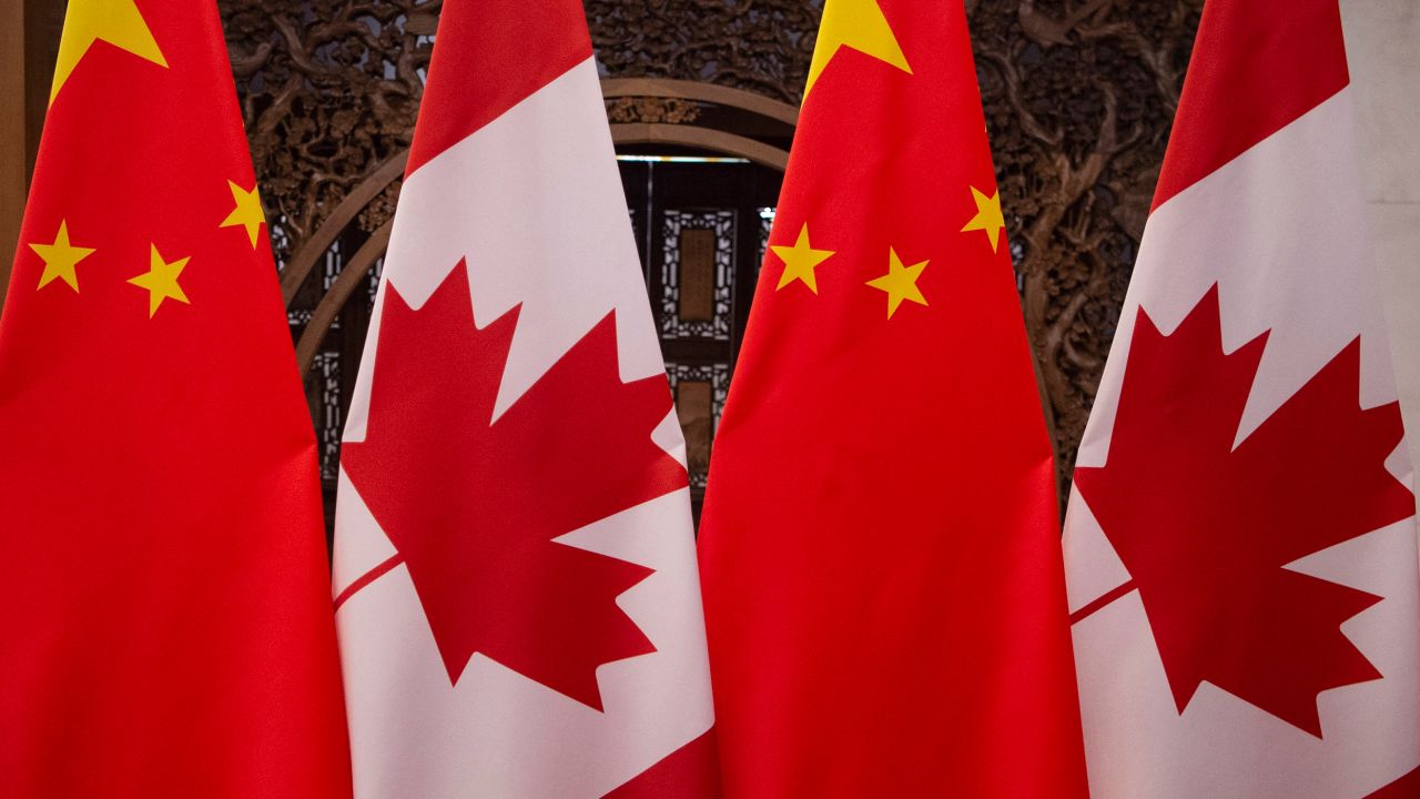 Canadian and Chinese flags are seen in 2017.
