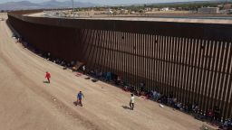 Migrants camp out next to the border barrier between El Paso, Texas and Ciudad Juárez, Mexico, May 3, 2023. 
