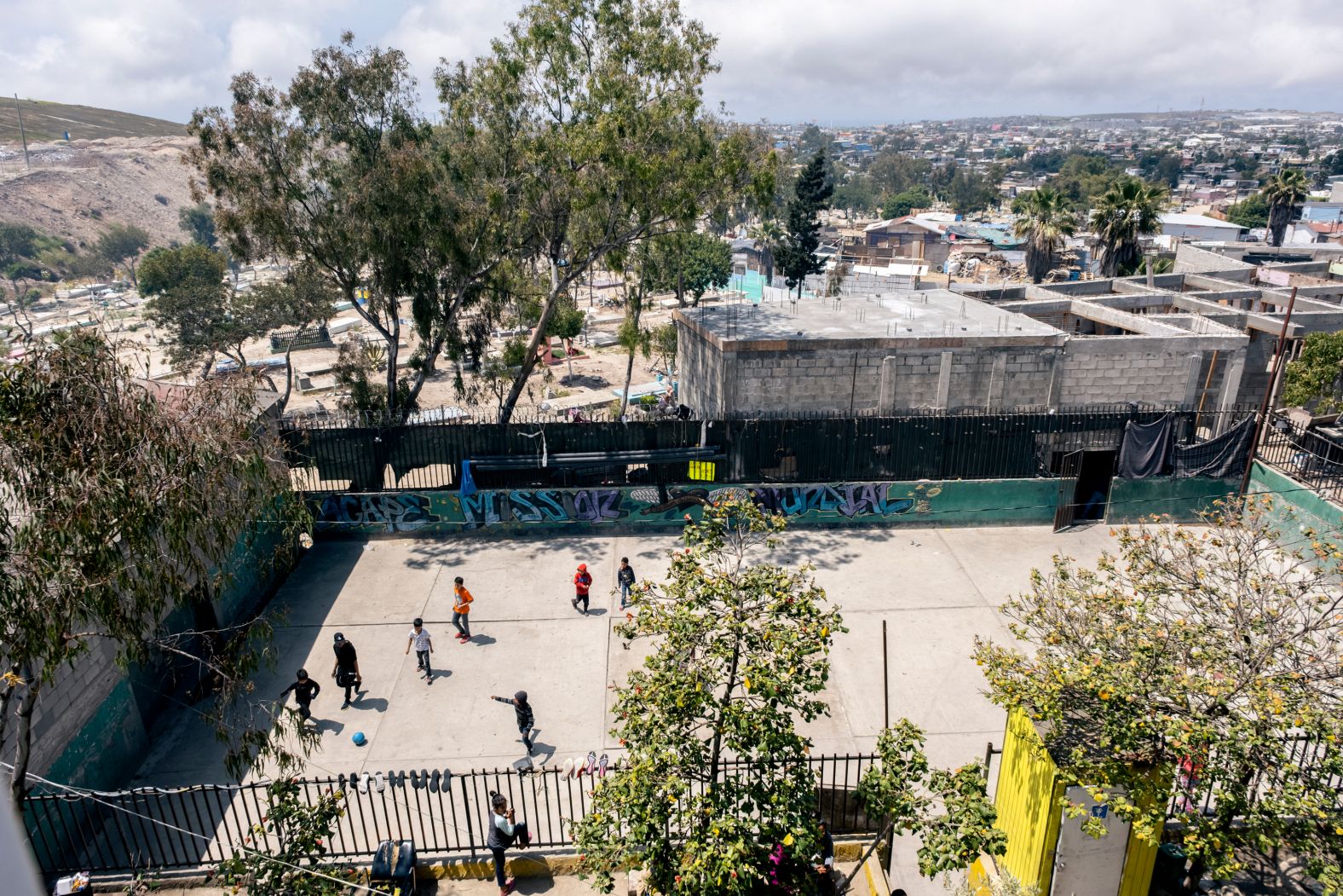Children play soccer at a shelter in Tijuana on May 3. Their families were awaiting the end of Title 42.