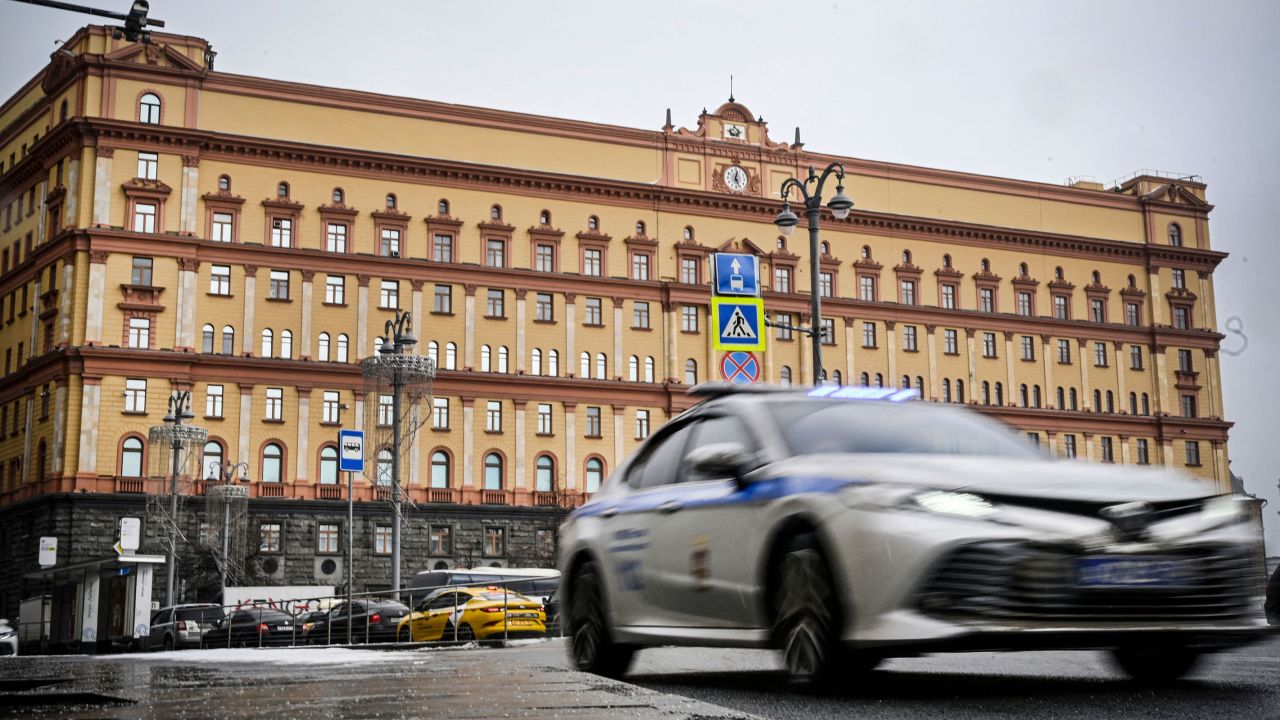A police car goes past the headquarters of the Federal Security Service (FSB) and Lubyanka Square in front of it in central Moscow on March 3.