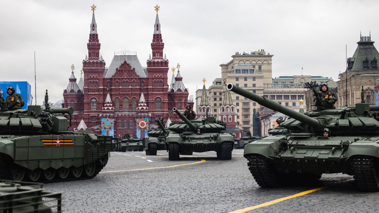 In the 2021 Victory Day parade, dozens of tanks are seen moving through Red Square.