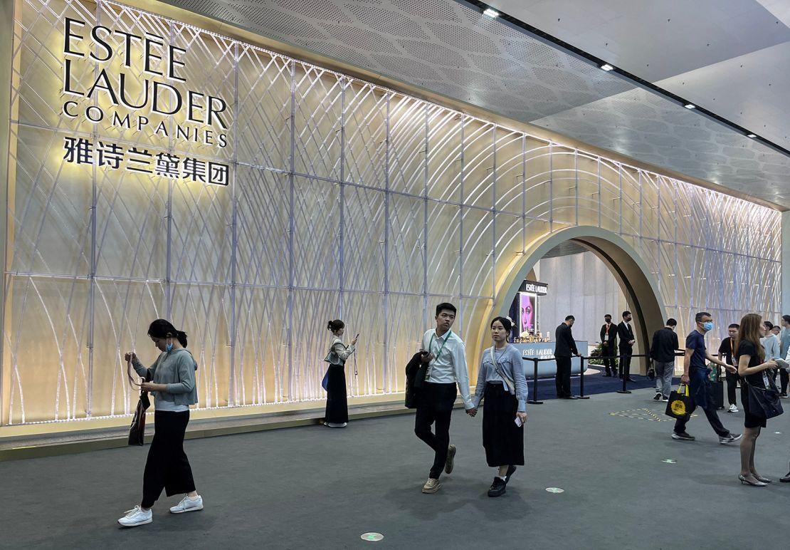 People walking past an Estée Lauder booth at an expo in Haikou, capital of Hainan island, in April.