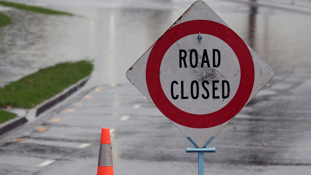Flooding and heavy rains in Auckland Tuesday prompted road closures and a local state of emergency declaration. 