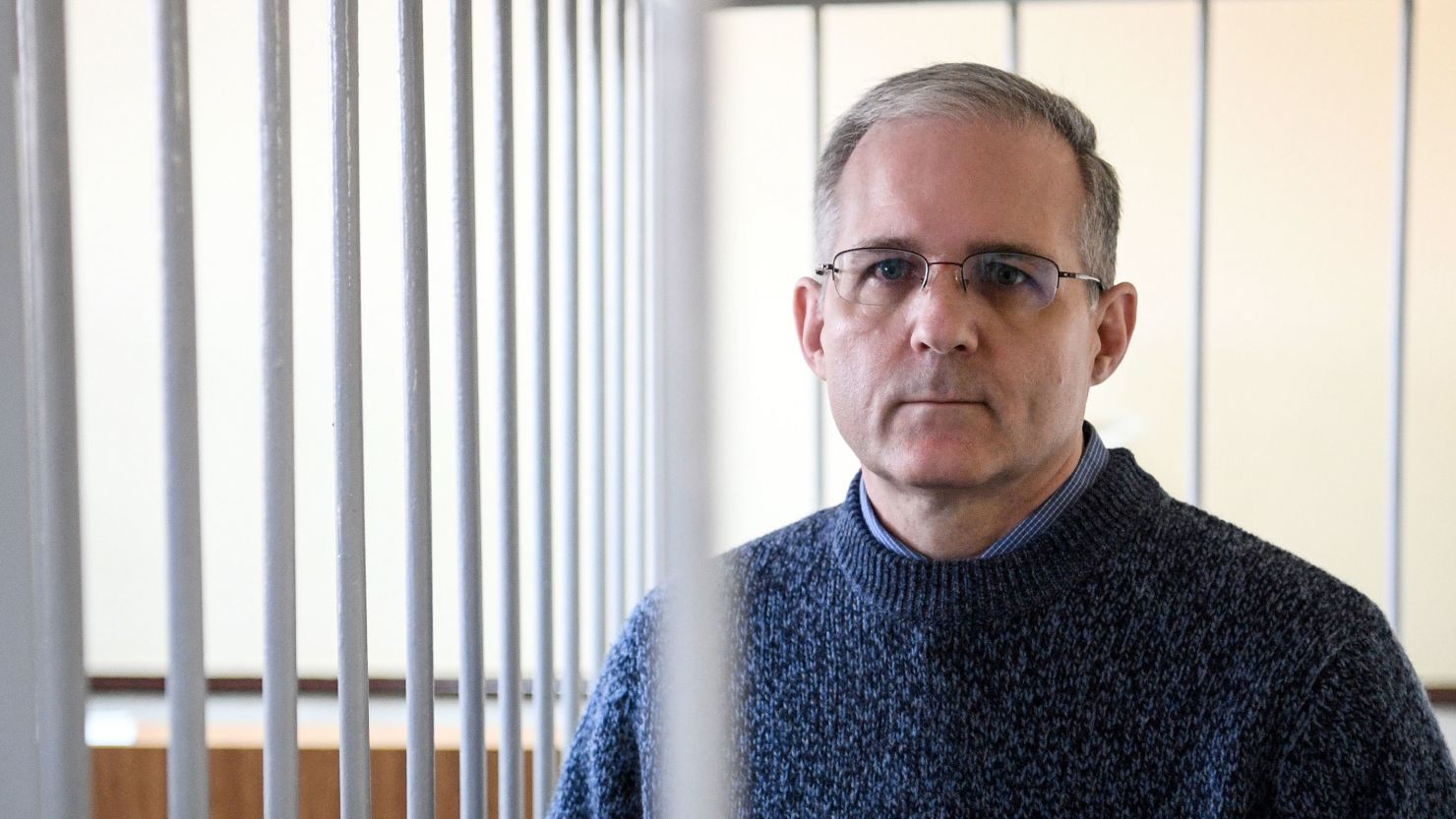 Paul Whelan, a former US Marine accused of spying and arrested in Russia stands inside a defendants' cage during a hearing at a court in Moscow on August 23, 2019.