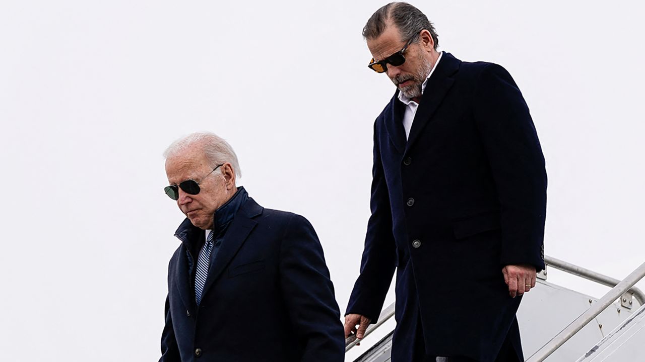 President Joe Biden and his son Hunter disembark from Air Force One at Hancock Field Air National Guard Base in Syracuse, New York, on February 4, 2023. 