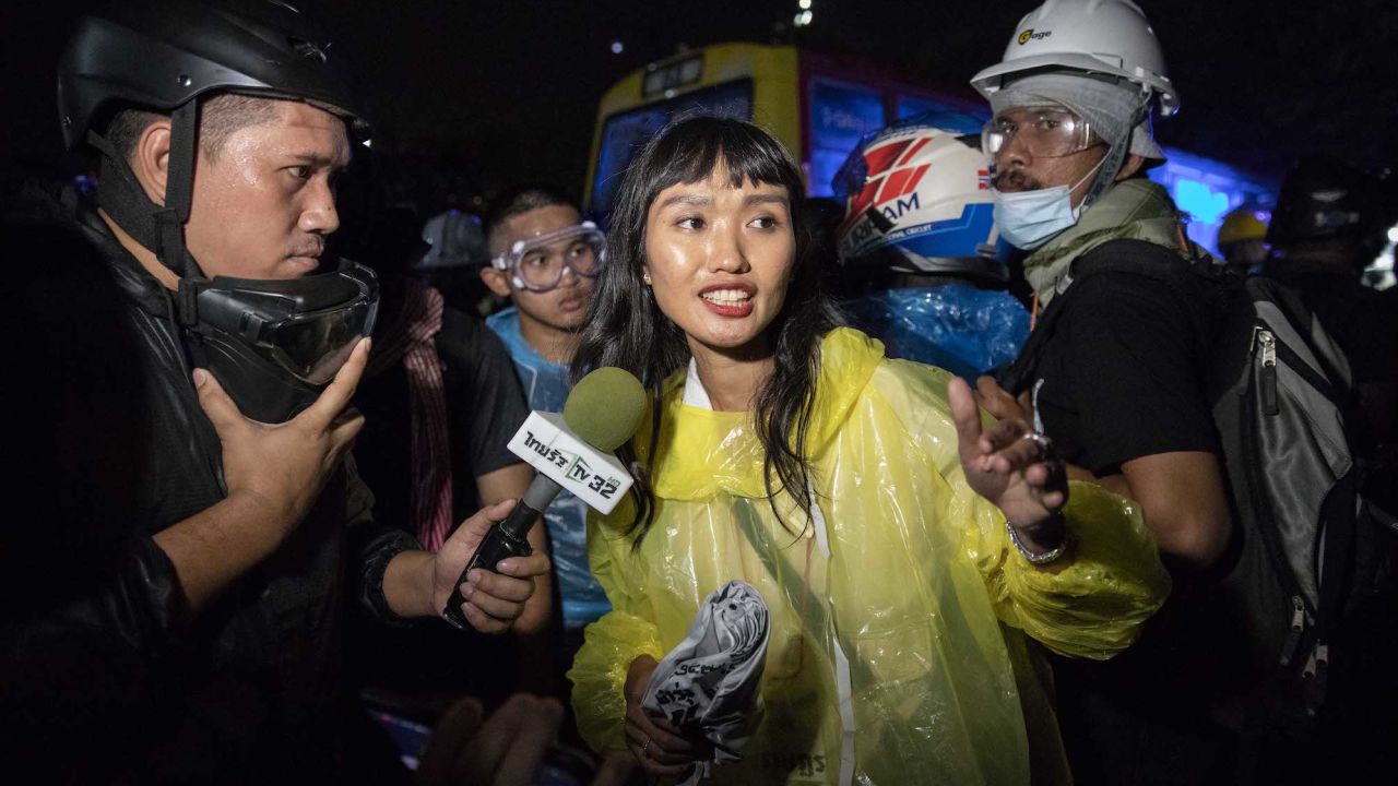 Protest leader, Chonthicha Jangrew, speaks to media as pro-democracy protesters and student activists march to The Grand Palace on November 8, 2020 in Bangkok, Thailand.  