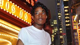 Jordan Neely is pictured before going to see the Michael Jackson movie,  outside the Regal Cinemas in Times Square, New York, in 2009.