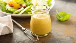 Homemade honey mustard salad dressing in a jar