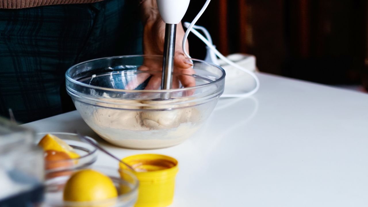 Make your dressing with a blender or food processor to emulsify the oil evenly with the acid. 