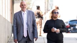 Deja Taylor arrives with attorney James Ellenson, left, to the Newport News Sheriffs Office in Newport News, Virginia, on April 13, 2023, to turn herself in. Taylor is the mother of the 6-year-old first grader who shot his teacher at Richneck Elementary School on Jan. 6. Taylor was charged with felony child neglect and a misdemeanor count of recklessly leaving a firearm so as to endanger a child.