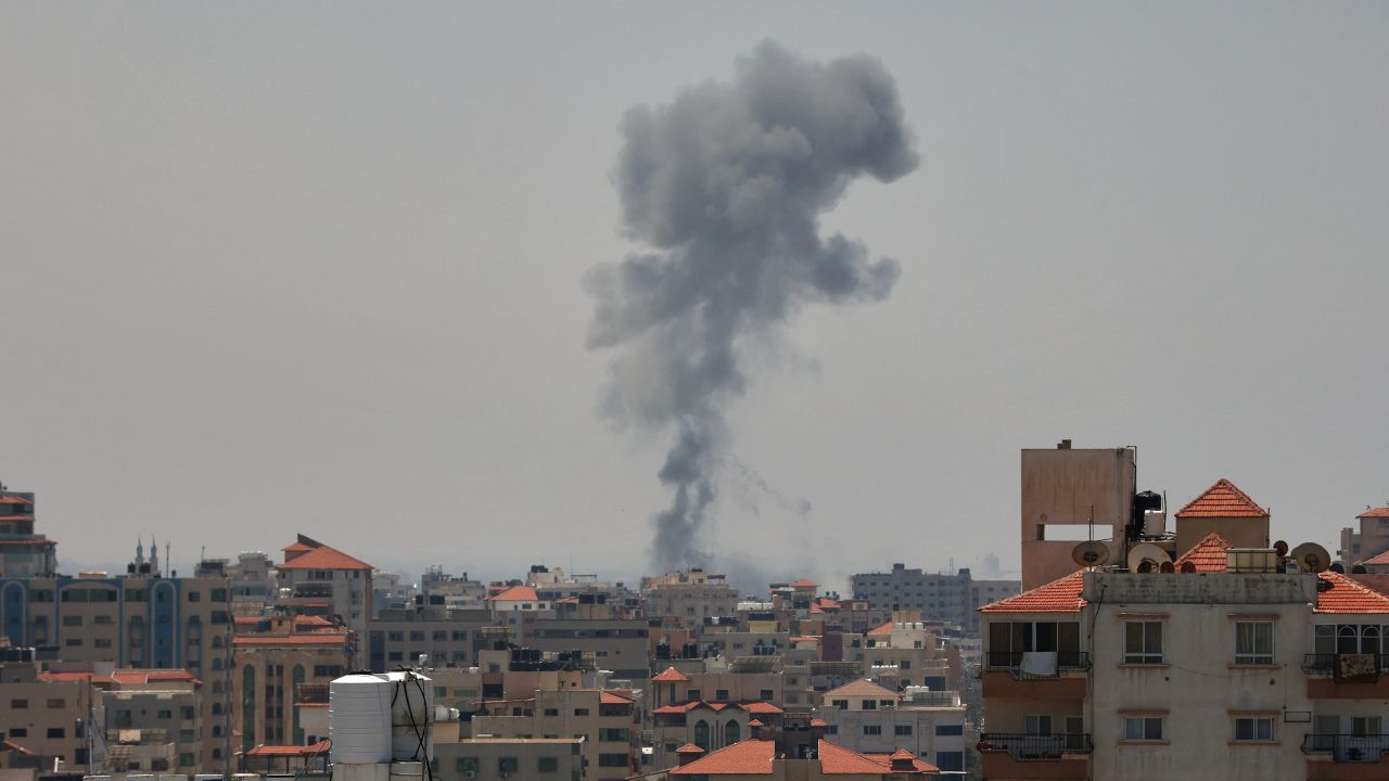Smoke billows following renewed Israeli military strikes launched into Gaza on May 10, 2023. 
