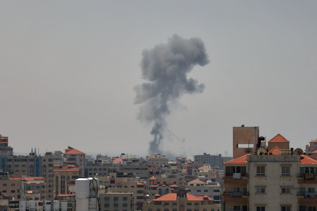 Smoke billows following renewed Israeli military strikes launched into Gaza on May 10, 2023. 