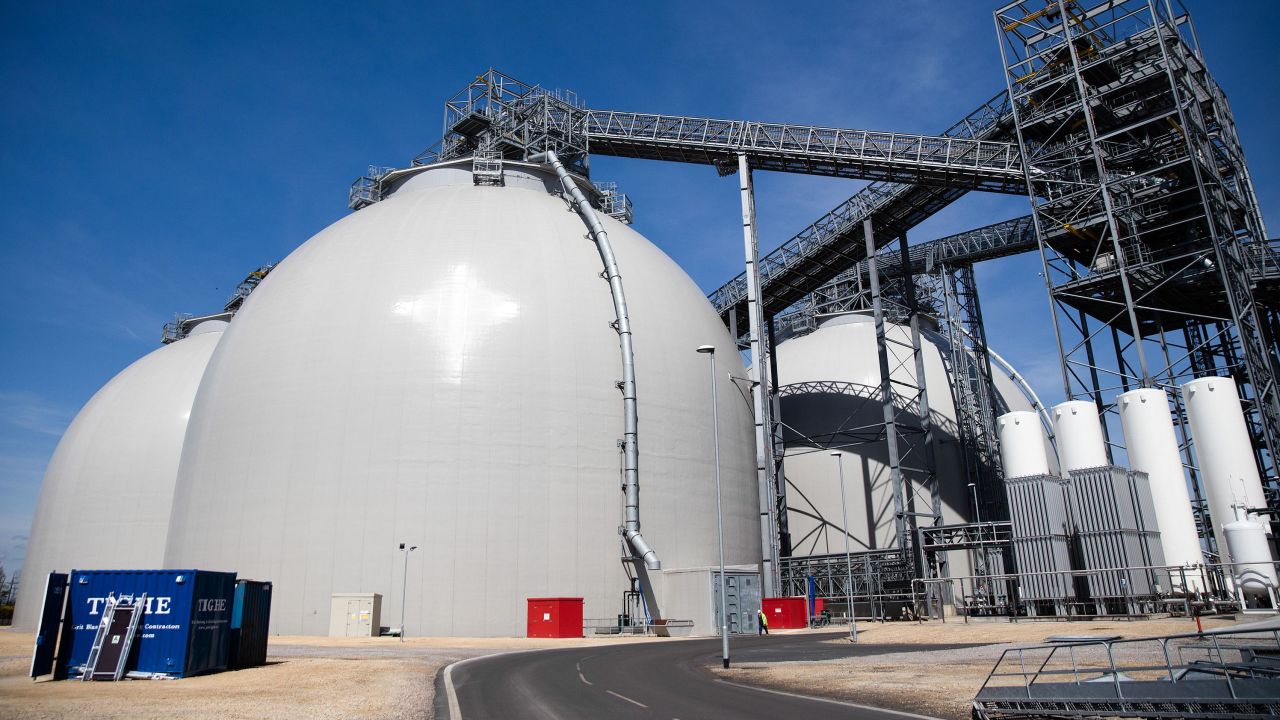 Biomass fuel storage tanks stand in the Drax power station near Selby, UK. Drax has been developing technology to store emissions from burning biomass.