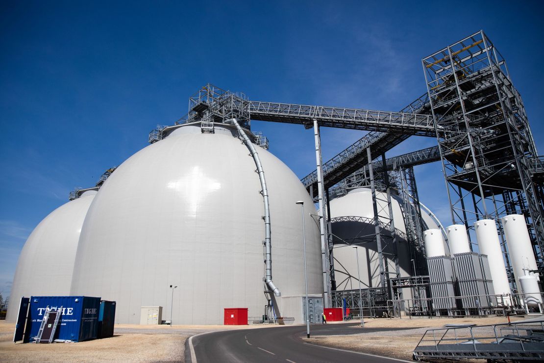 Biomass fuel storage tanks stand in the Drax power station near Selby, UK. Drax has been developing technology to store emissions from burning biomass.