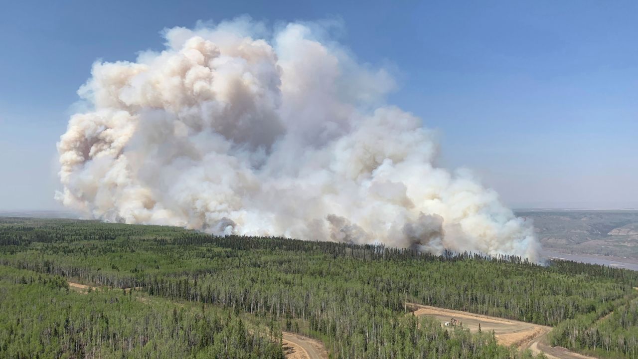 A wildfire burns a section of forest in the Grande Prairie district of Alberta, Canada, Saturday, May 6, 2023.