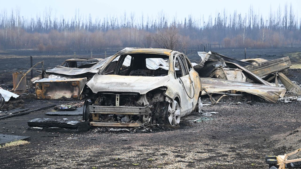 Damaged vehicles sit near the property of Adam Norris, in Drayton Valley, Alberta, Canada, on May 8, 2023.