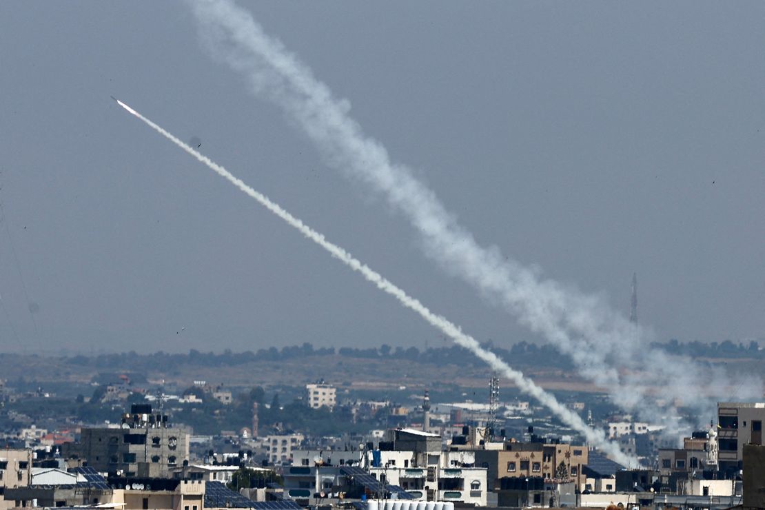 Rockets fired from Gaza into Israel streak across the sky on Wednesday.