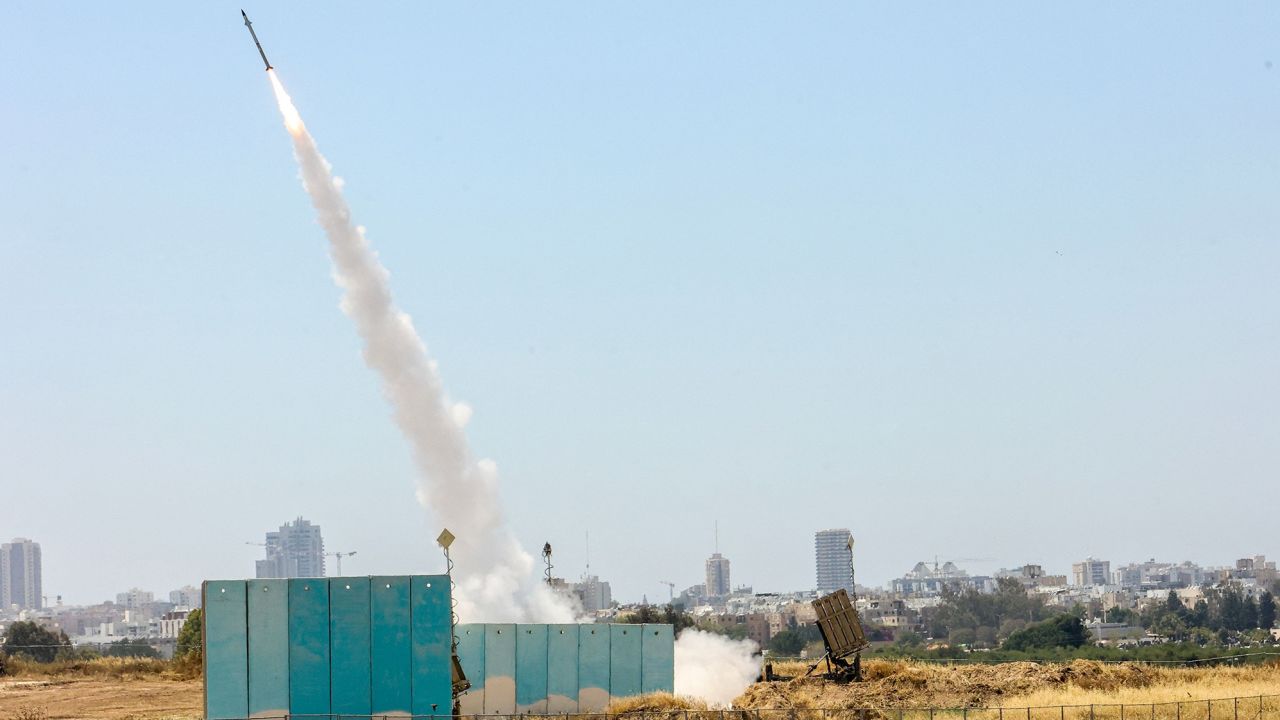 The Israeli military fires a rocket from their Iron Dome defense system towards Gaza on May 10, 2023, as violence in the region escalates.
