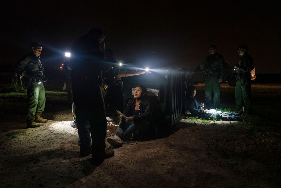 Migrants who were trying to evade US Border Patrol agents wait to be processed in Granjeno, Texas, on May 4.
