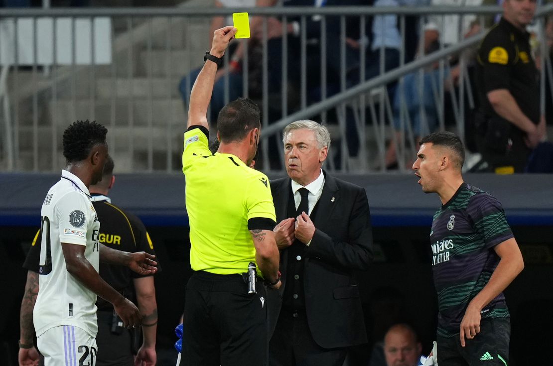 Ancelotti is yellow carded on the sidelines against Manchester City. 