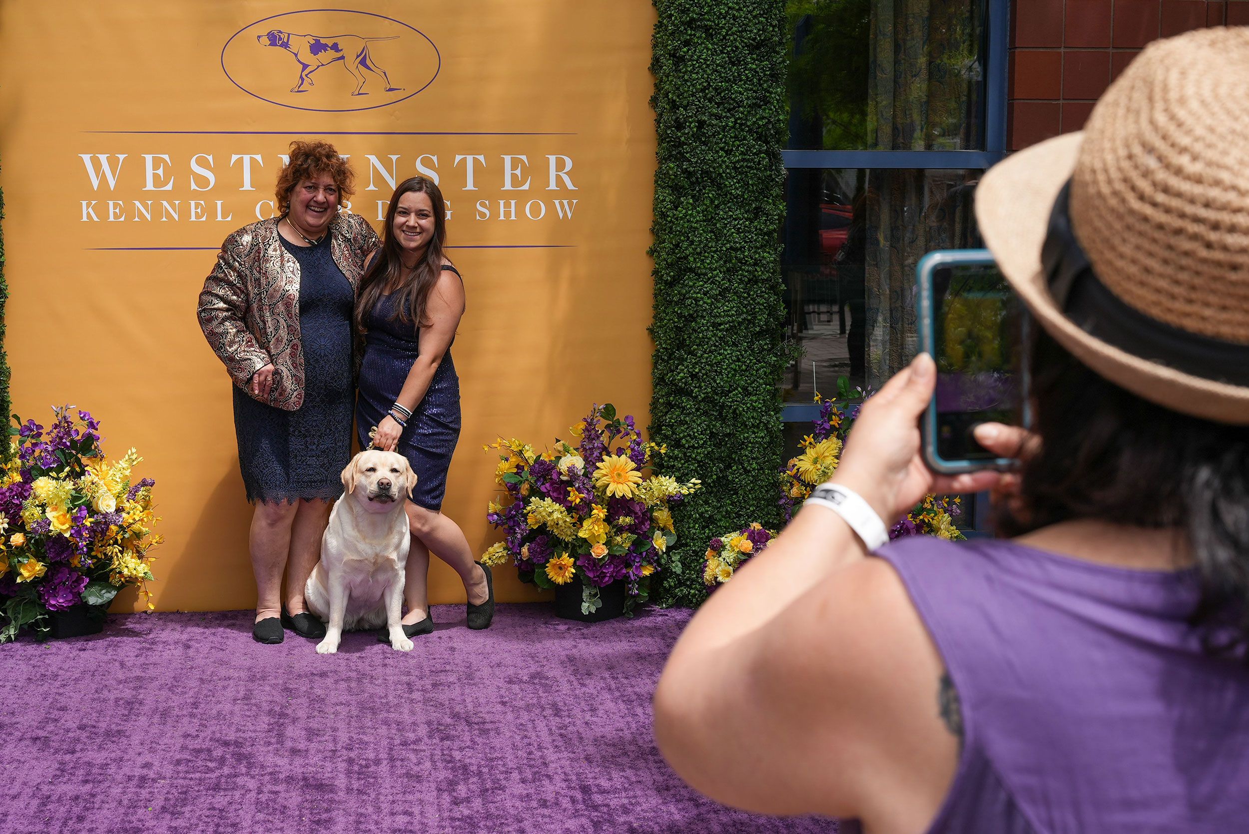 People pose for photos at the event on Tuesday.