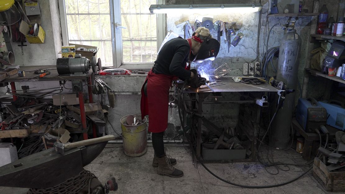 Maria Kobets says work in the blacksmith forge is tiring but interesting.