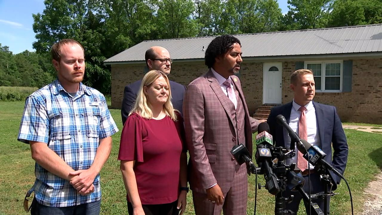 Trevor Mullinax and his family hold a news conference on May 9, 2023, with their lawyer about the lawsuit.