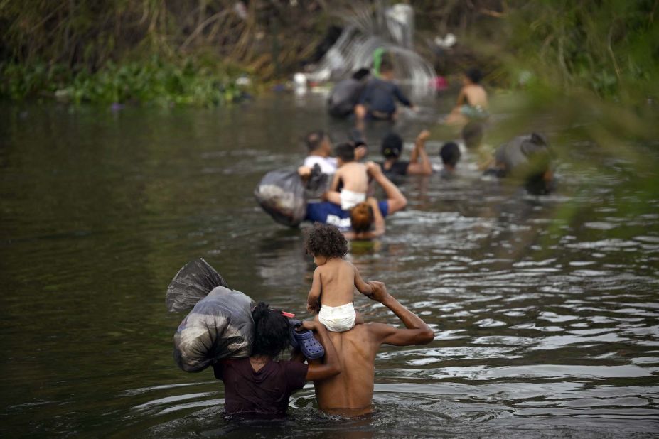 Migrants cross the Rio Grande from Matamoros on May 10.