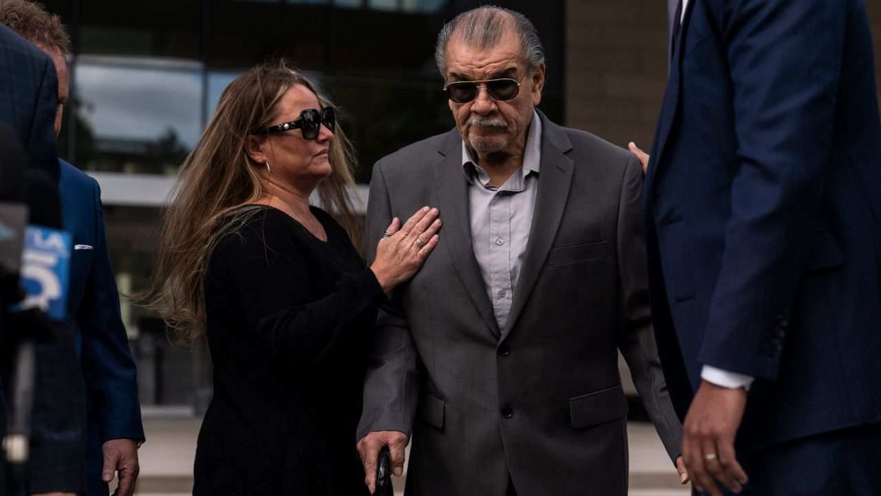 Edward Tapia, father of Edward Bronstein, who died while in custody of the California Highway Patrol in 2020, is comforted by Aundrea, Bronstein's long-time girlfriend and mother of his children, in Los Angeles Wednesday. 