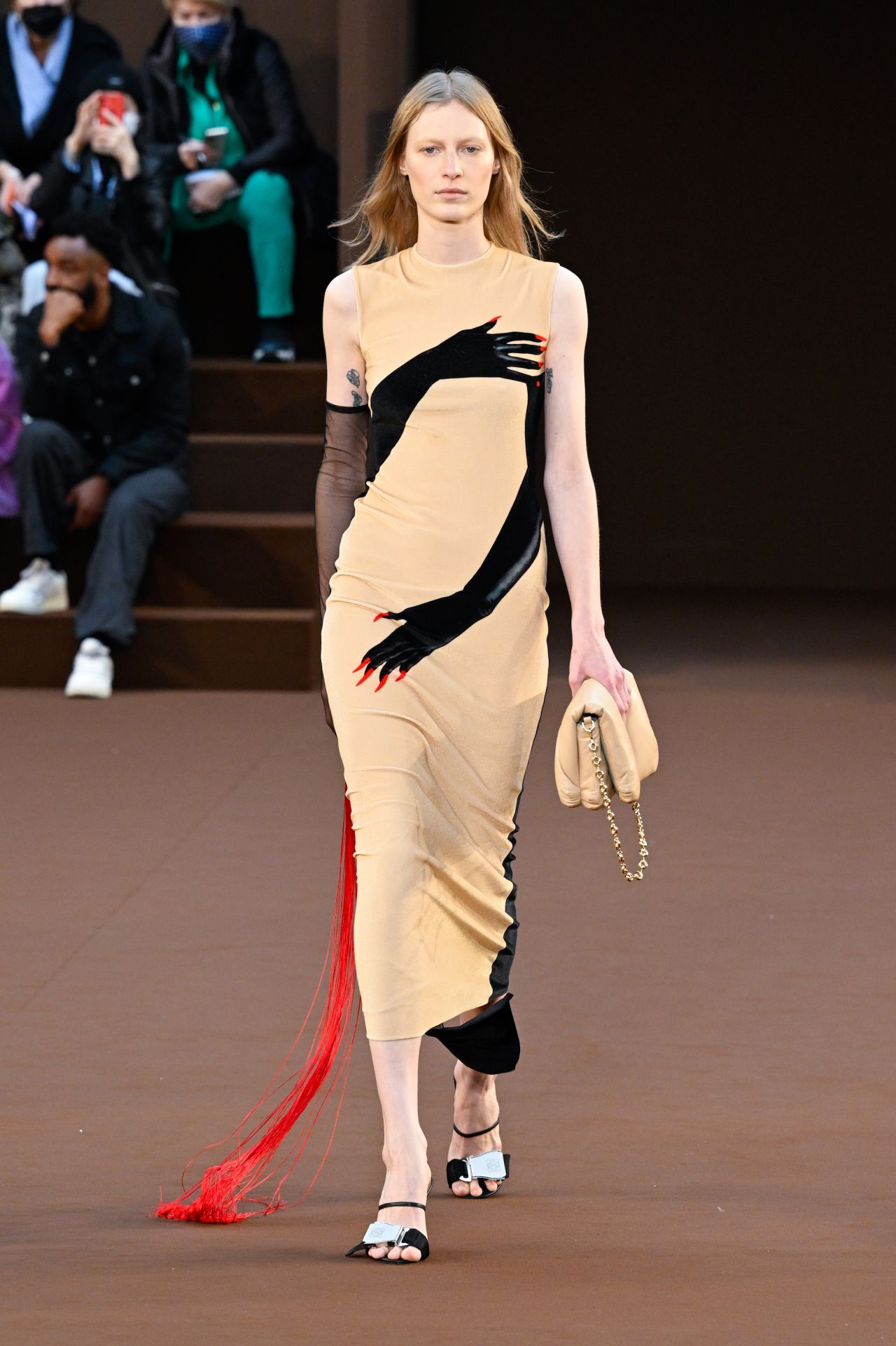 A model wears a dress featuring Loewe's hand motif during last year's Fall-Winter 2022 Paris Fashion Week.