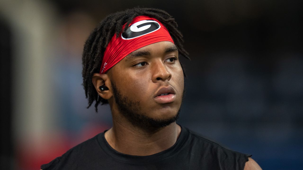 ATLANTA, GEORGIA - SEPTEMBER 03: Devin Willock #77 of the Georgia Bulldogs looks on with his helmet off prior to the Chick-fil-A Kickoff Game between Oregon and Georgia at Mercedes-Benz Stadium on September 03, 2022 in Atlanta, Georgia. (Photo by Paul Abell/Getty Images)