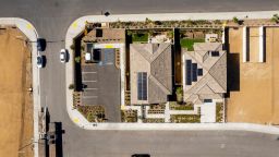 Model homes at a KB Home development in Menifee, California, US, on Wednesday, Nov. 1, 2022. Some 200 homes under construction in California come with solar panels, heat pumps and batteries, forming microgrids that cut energy costs and emissions. Photographer: Kyle Grillot/Bloomberg