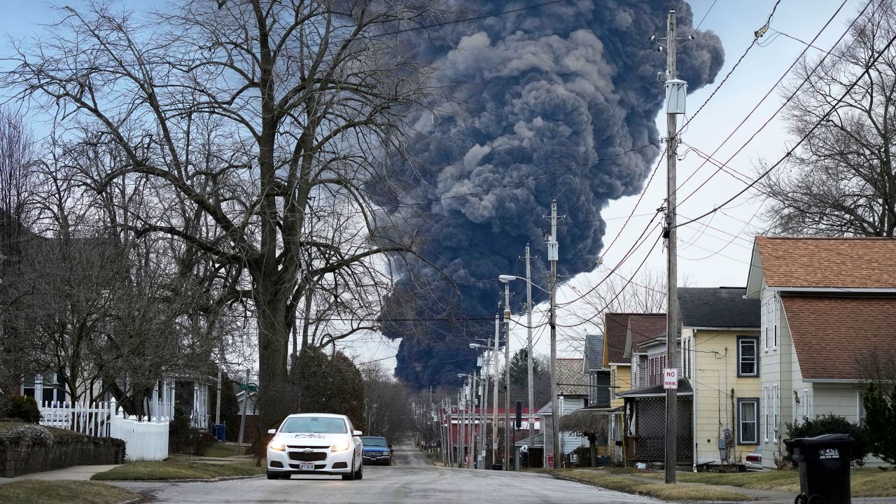 A black plume rises over East Palestine, Ohio, as a result of a controlled detonation of a portion of the derailed Norfolk Southern trains Monday, Feb. 6, 2023. (AP Photo/Gene J. Puskar)