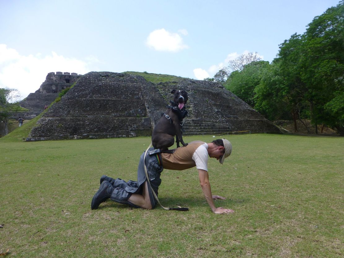 The Clarke's beloved dog Skyla, seen with Stu in Belize back in 2014, passed away a few months into their trip.