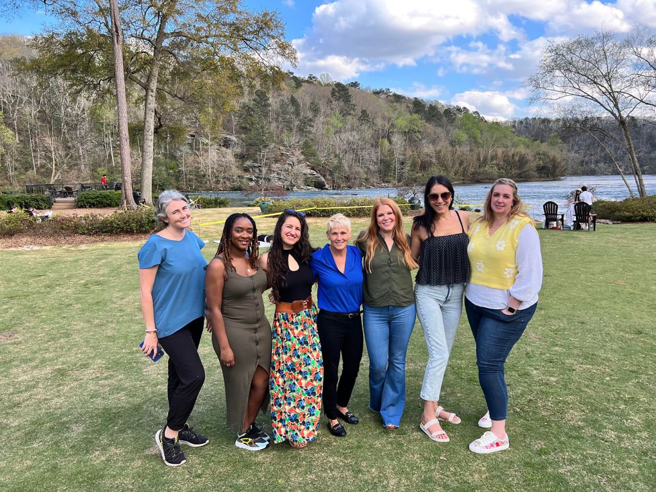 Sahara Rose De Vore, founder of the Travel Coach Network, pictured, second from right, with members during an event in Atlanta.