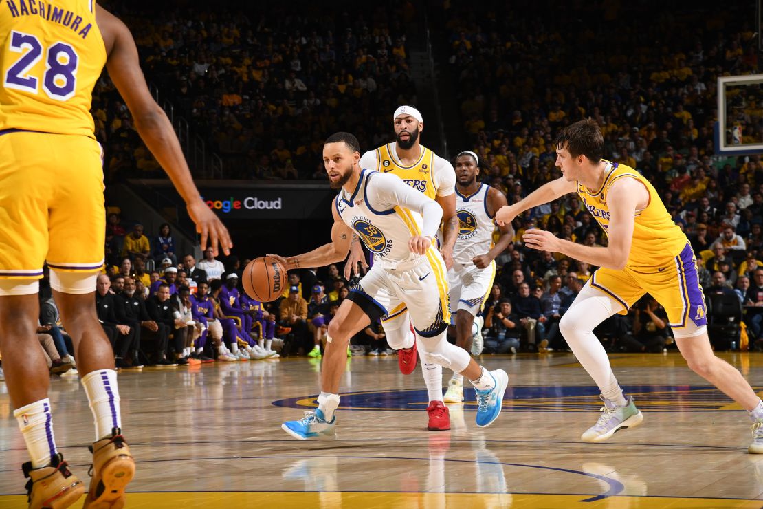 Curry dribbles the ball during Game 5 