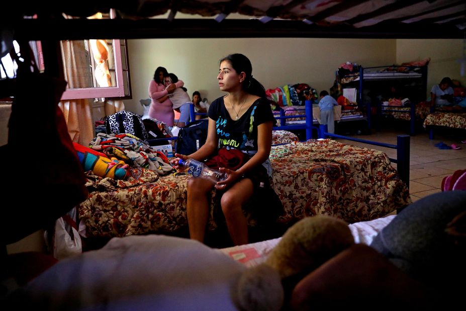 Norma Garcia Bonilla, from Michoacán, Mexico, waits at Albergue del Desierto, a migrant shelter in Mexicali, Mexico, across from the California border, on Wednesday, May 10. She is seeking asylum in the United States.