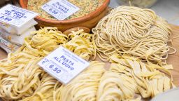 Fresh pasta stall inside the Porta Palazzo market, the largest indoor and outdoor market in Europe, in Turin, Italy, February 10th, 2022. Photo by Marta Carenzi/Mondadori Portfolio via Getty Images. 