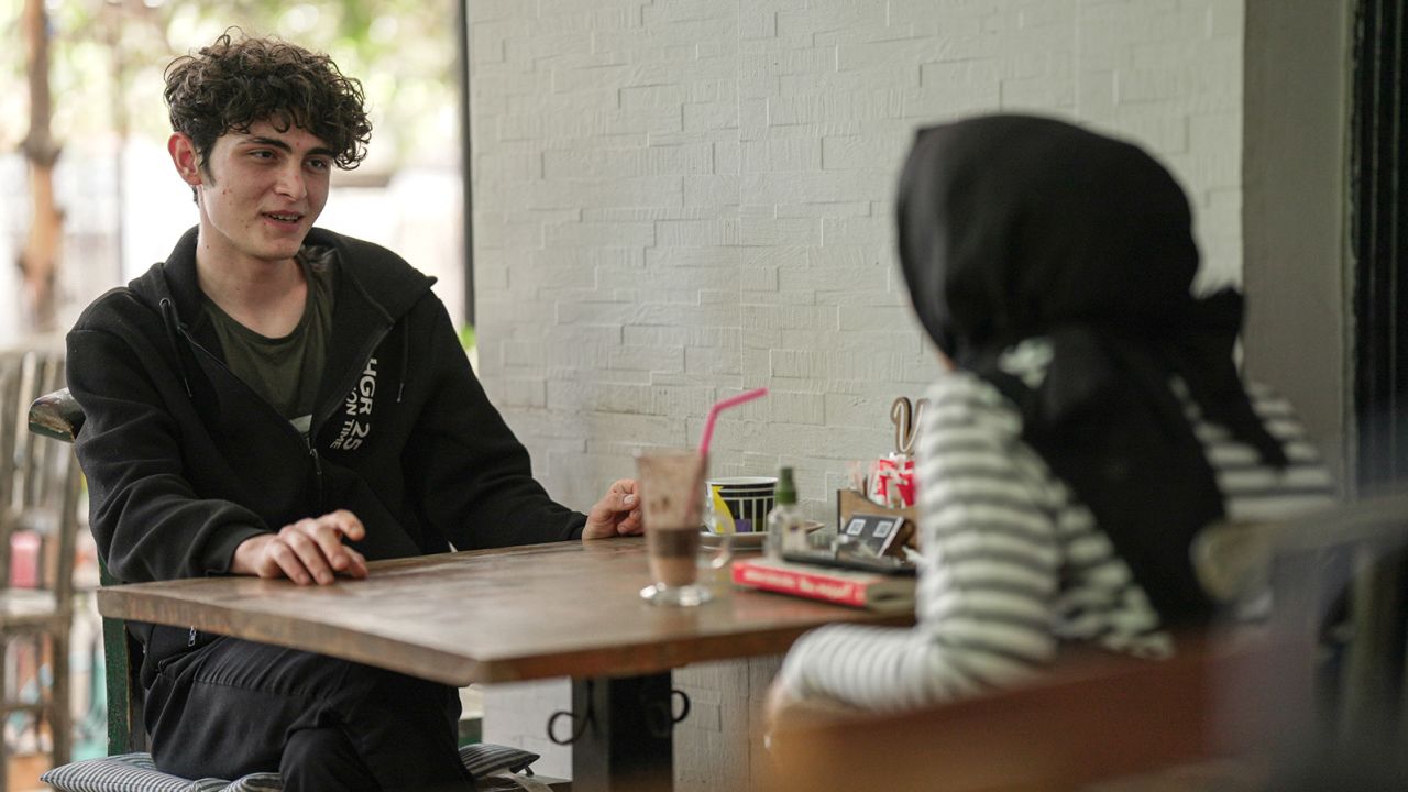 A first-time voter, Ziya Kaveci, says he prefers to stay out of politics, and believes the possible unseating of Erdogan in the presidential election could prompt riots in the president's powerbase of Kahramanmaras.