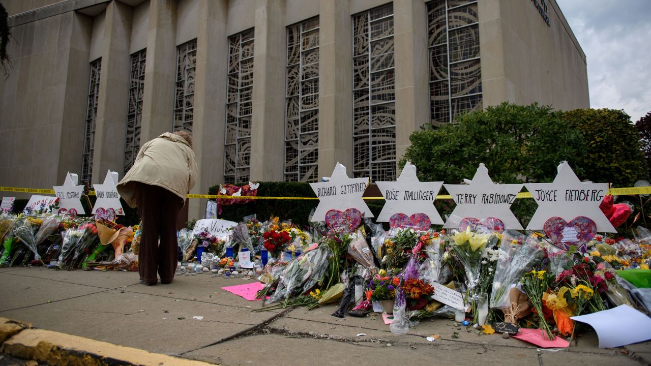 PITTSBURGH, PA - OCTOBER 31:  Mourners visit the memorial outside the Tree of Life Synagogue on October 31, 2018 in Pittsburgh, Pennsylvania. Eleven people were killed in a mass shooting at the Tree of Life Congregation in Pittsburgh's Squirrel Hill neighborhood on October 27. (Photo by Jeff Swensen/Getty Images)